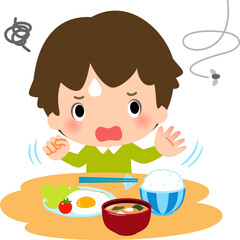 食卓でハエを追い払う男の子