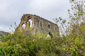 Fototapeta premium Old ruined fortress gate, Mangup-Kale city in the Crimea.