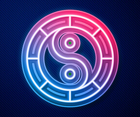 Glowing neon line Yin Yang symbol of harmony and balance icon isolated on blue background. Vector