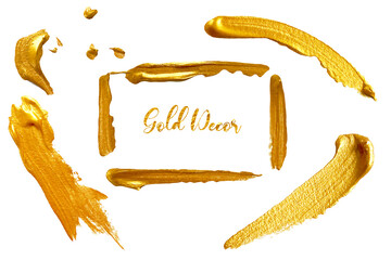 Real watercolor gold paint smear stroke stain. Abstract gold glittering textured background.