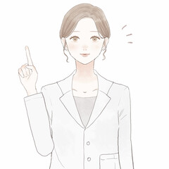 指をさしながら説明している女性医師