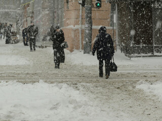 Overcast. Natural disasters winter, blizzard, heavy snow paralyzed city car roads, collapse. Snow covered cyclone