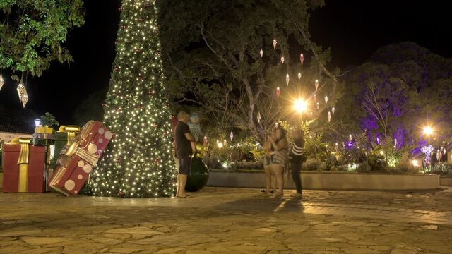 Time lapse from people taking photos in front of christmas decoration in Tiradentes city, in Minas Gerais state, Brazil