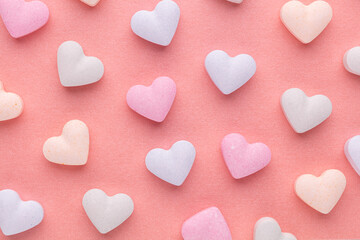 Composition with candy hearts on pastel blue background. - 471669837