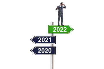 Businessman on the signpost from 2021 to 2022