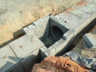 SELANGOR, MALAYSIA -JANUARY 22, 2021: Underground precast concrete box culvert drain under construction at the construction site. It is used to channel stormwater to prevent flash floods.  - obrazy, fototapety, plakaty