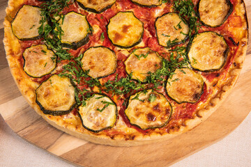 Vegetarian Provencal quiche recipe with vegetables, zucchini, tomato, pepper, onion, parsley. High quality photo