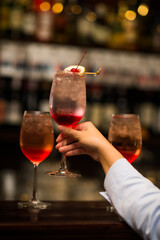 celebrate cocktail on blur bar background