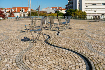 Movable Stainless steel chairs on sliding rails in Castelo Branco Portugal