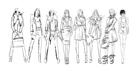 Set of young beautiful women in stylish clothes. Sale concept. Hand-drawn fashion illustration. Fashion sketch.