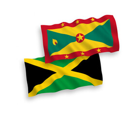 National vector fabric wave flags of Grenada and Jamaica isolated on white background. 1 to 2 proportion.