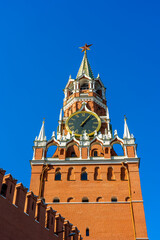 Fototapeta na wymiar Spasskaya Tower Chiming Clock in Moscow Kremlin, Details of famous architecture building, closeup view, sunny day.