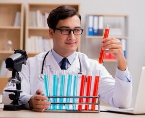 Man doctor working in the lab