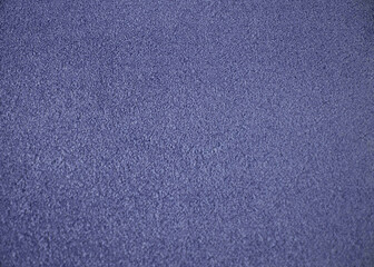 Blue indoor office carpet texture. High resolution seamless monochrome wool fabric background. Interior material background top view. Short pile carpet. Blank generic microfiber textile texture.