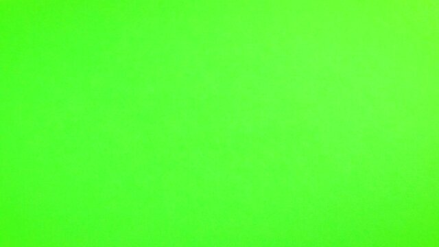 Unwrapping gift revealing a green screen - Stop Motion Animation - Red bow on black and white wrapping paper