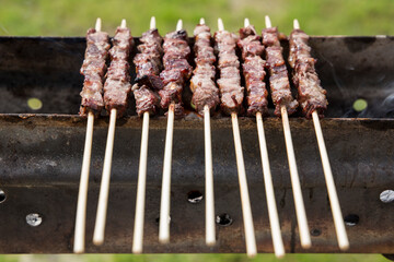 Arrosticini in cottura