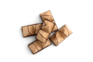 Pyramid shaped chocolate filled waffle cookies isolated on white background.