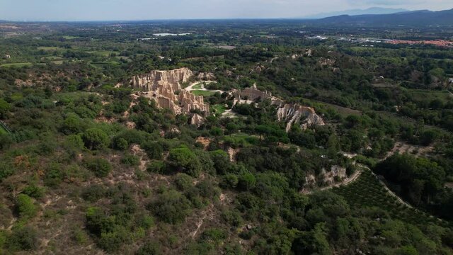 Aerial shot of the sandstone geologic organ shape formation of Ille sur Tet in south of France