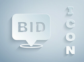 Paper cut Bid icon isolated on grey background. Auction bidding. Sale and buyers. Paper art style. Vector