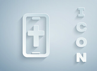 Obraz premium Paper cut Christian cross on mobile phone icon isolated on grey background. Church cross. Paper art style. Vector