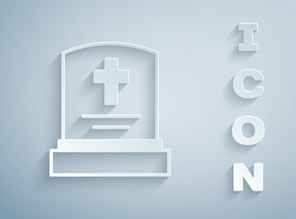 Paper cut Grave with tombstone icon isolated on grey background. Paper art style. Vector