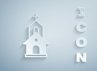 Paper cut Church building icon isolated on grey background. Christian Church. Religion of church. Paper art style. Vector