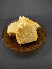 Photo of cheesecake isolated on black background, Not Focus