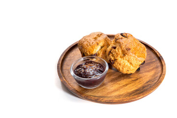 Homemade sultana scones isolated on white background