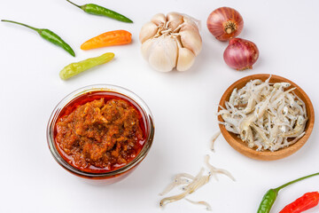 sambal ikan teri or anchovy chili is type of traditional cuisine from Indonesia. Indonesian chili sauce. Sambal ikan teri shoot on White Background. Negative Space. 
