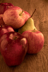 Red apple fruits macro on kitchen table.