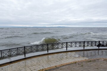 Embankment of Lake Baikal in village of Turka in storm