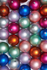 Top view of set of colorful christmas balls in row