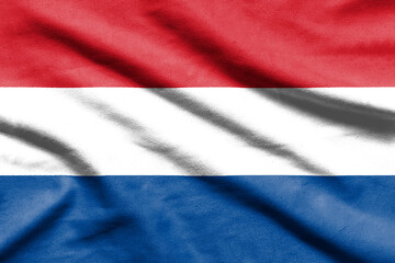 Netherlands flag on wavy fabric.