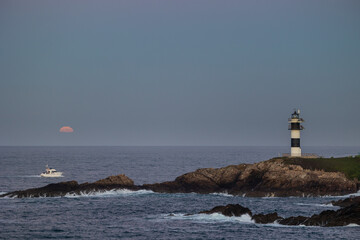 November Full Moon over the Illa Pancha lighthouse and hotel, in Ribadeo, Galicia, Spain!