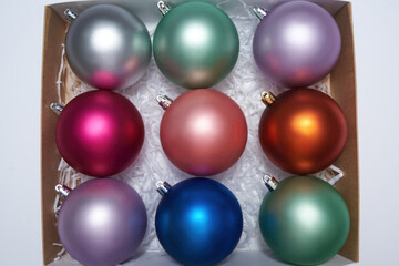 Close up of cardboard package with christmas balls