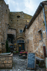 Fototapeta na wymiar Tuscany, Italy, May 2018, cafe in the medieval town of Civita