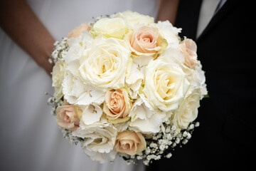 Wedding bouquet which the bride holds in her hand