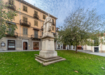 Saluzzo, Cuneo, Italy - October 19, 2021: Statue of Silvio Pellico in Liderico Vineis square. Pellico was born in Saluzzo in 1789 and was a writer, poet and patriot author of My Prisons.