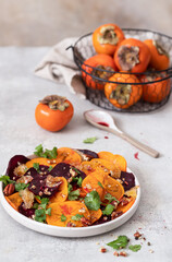 Winter salad of beets, persimmons, lemon and cilantro	