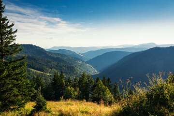 The hills of the Black Forest disappear into the haze in the evening.