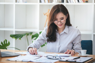 business woman work in the business office on the desk