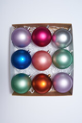 Cardboard package with set of New Year balls