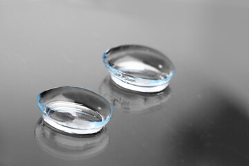 contact lenses on dark background close up view   - Image