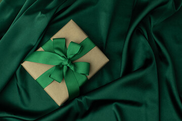 Box wrapped in craft paper on craft paper background
