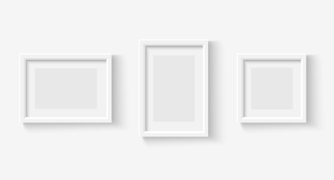 Photo frames on wall. White picture frame set. Vector empty realistic gallery