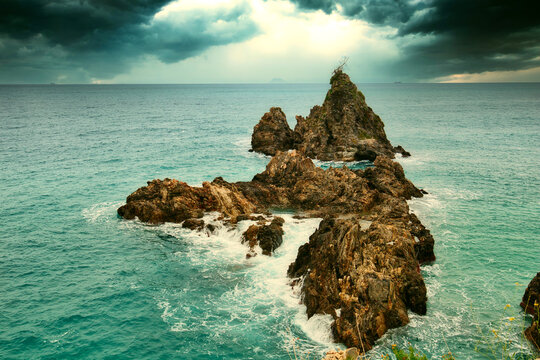The rock of Ulivarella just before a storm