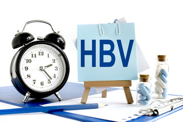 HBV. text on blue sticker near medicine jar plant in pot with