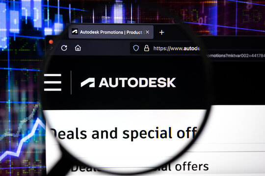 Autodesk company logo on a website, seen on a computer screen through a magnifying glass.