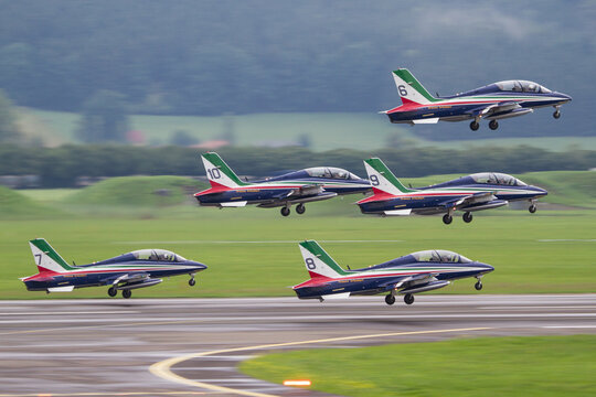 Italian aerobatic team Frecce Triccolori taking off at an airshow for a display