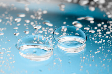 contact lenses with droplets around close up view  - Image